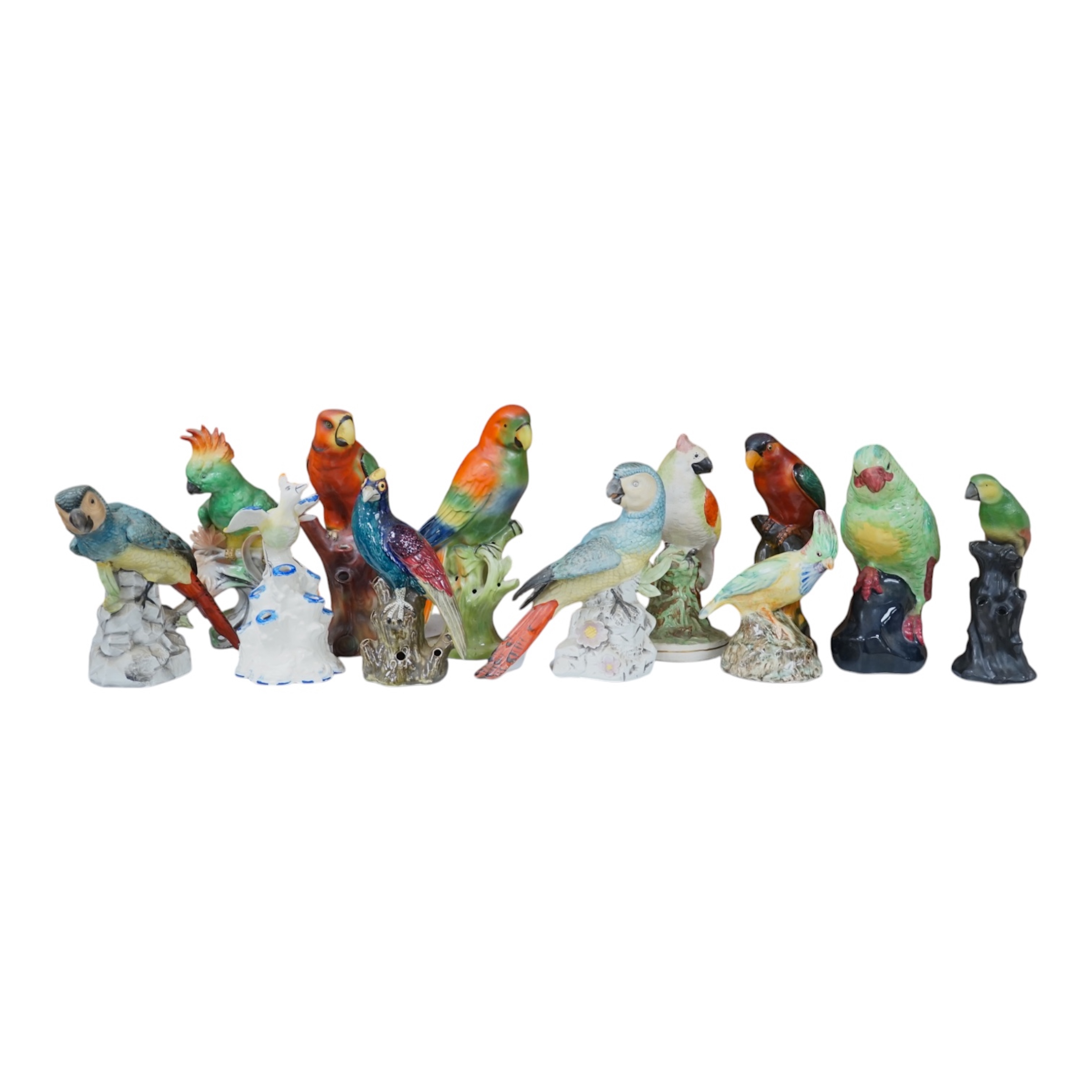 A group of twelve ceramic parrots including one by S Hancock & Sons, largest 24cm high. Condition - mostly good